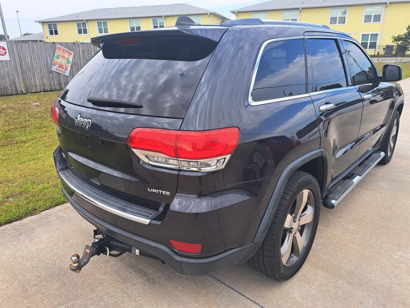 2014 Grey Jeep Grand Cherokee (1C4RJEBG6EC) , located at 1181 Aurora Rd, Melbourne, FL, 32935, (321) 241-1100, 28.132914, -80.639175 - Photo#2